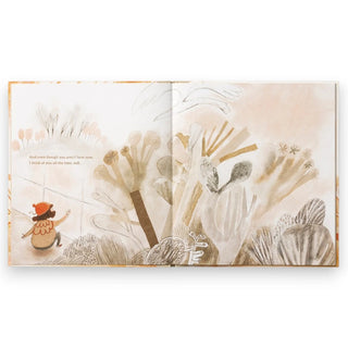 Open book with illustrations of a child and bush scene on a white background