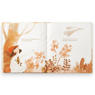 Open book with watercolor illustrations of a person and nature on a white background