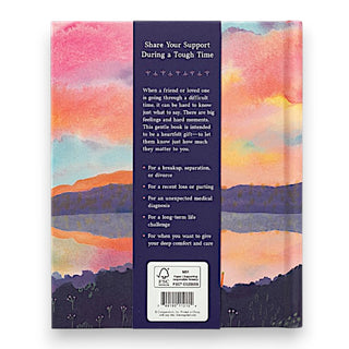 Back of the book with colorful landscape design on the cover