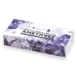 Amethyst crystal facial roller packaging with purple gemstone design on a white background
