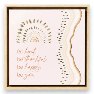 Framed artwork with motivational quote 'Be kind. Be thankful. Be happy. Be you.' on a white background.