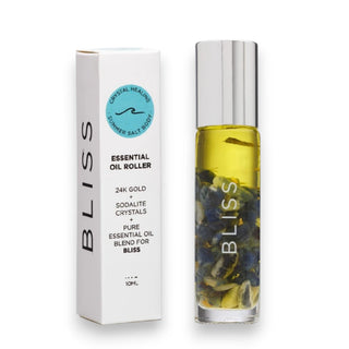 Bliss essential oil roller with packaging on a white background