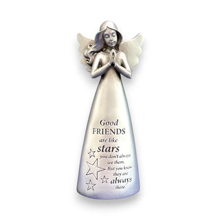 A silver resin angel statue with wings and hands in a prayer position with the inscription Good friends are like stars, you don't always see them but you know they are always there.