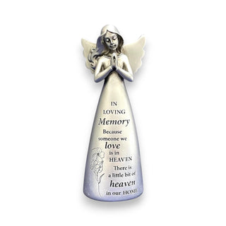 Silver resin angel statue with wings and hands in a prayer position with the inscription In loving memory because someone we love is in heaven there is a little bit of heaven in our home