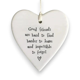 Heart-shaped hanging ornament with engraved text on a white background