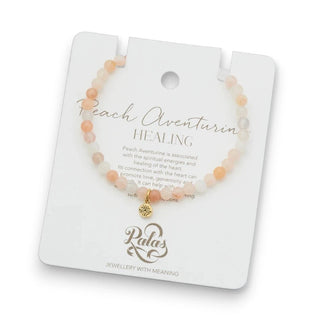 Peach Aventurine beaded bracelet on a branded card with 'Peach Aventurine Healing' text.