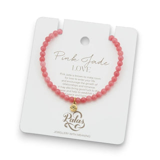 Pink jade bracelet on a Palas branded card with text